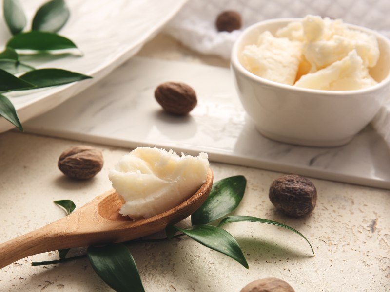 Picture of shea butter on wooden spoon 