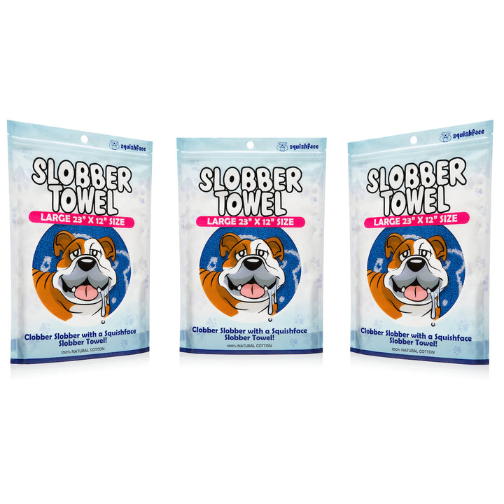 Three packages of Slobber Towel with a cartoon dog on the packaging.